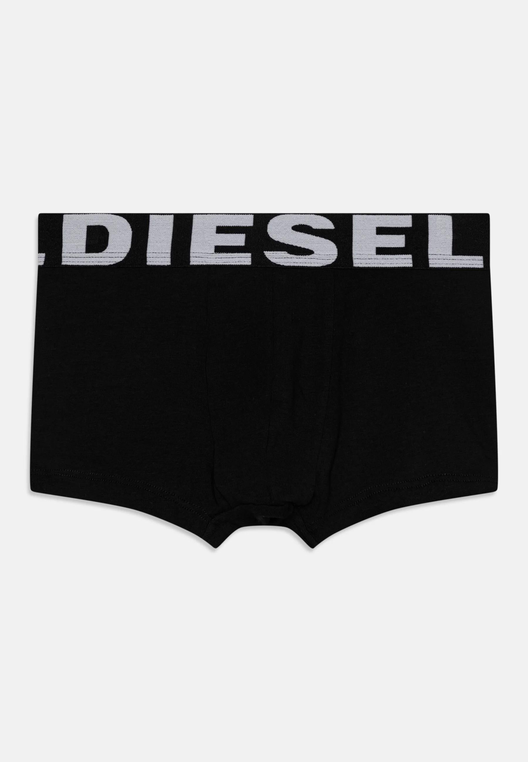 Boxer lungo da bambino in jersey di cotone stretch. Elastico in vita metallizzato con maxi scritta Diesel all-over. J01911-KYAYJ K9008 DIESEL 